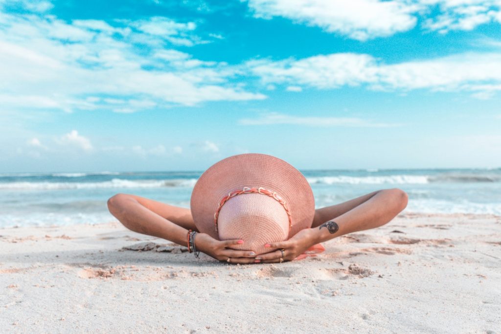Person lying on the beach